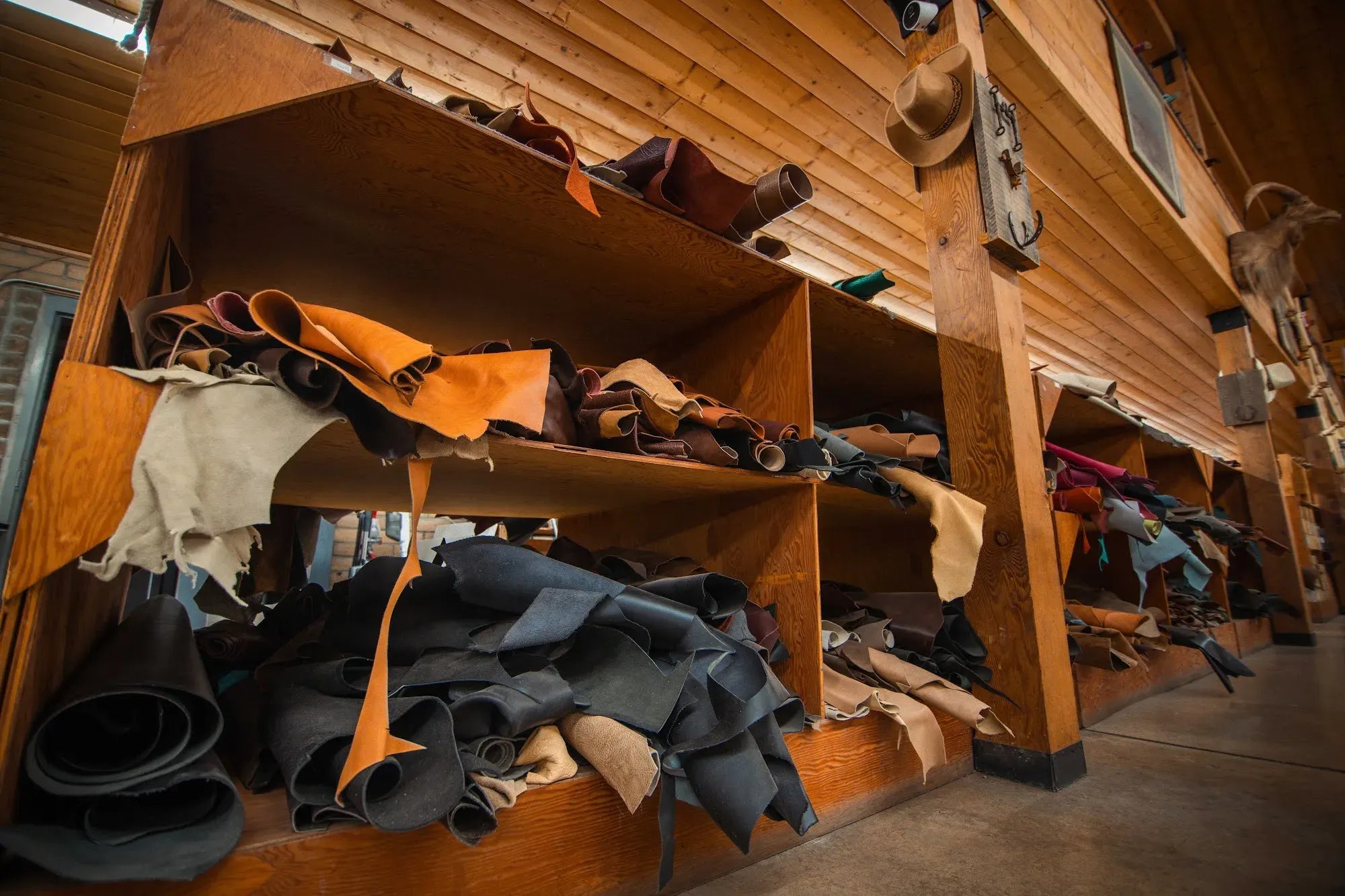 Shelves of exotic and calfskin hides