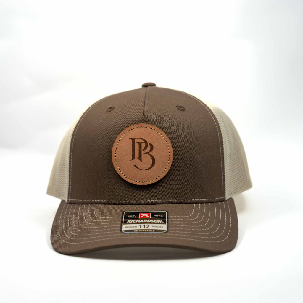 Trucker Hat | Chocolate Chip & Burch | Circular Monogram Logo Patch