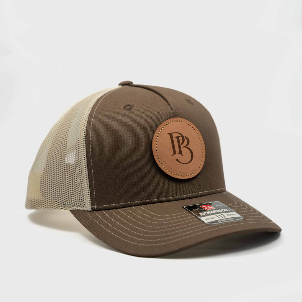 Trucker Hat | Chocolate Chip & Burch | Circular Monogram Logo Patch
